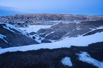 photograph of badlands in snow
